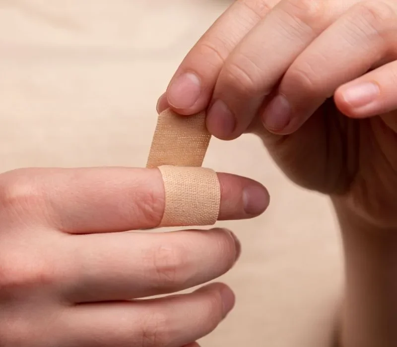 Olycksfallsförsäkring – plåster på finger